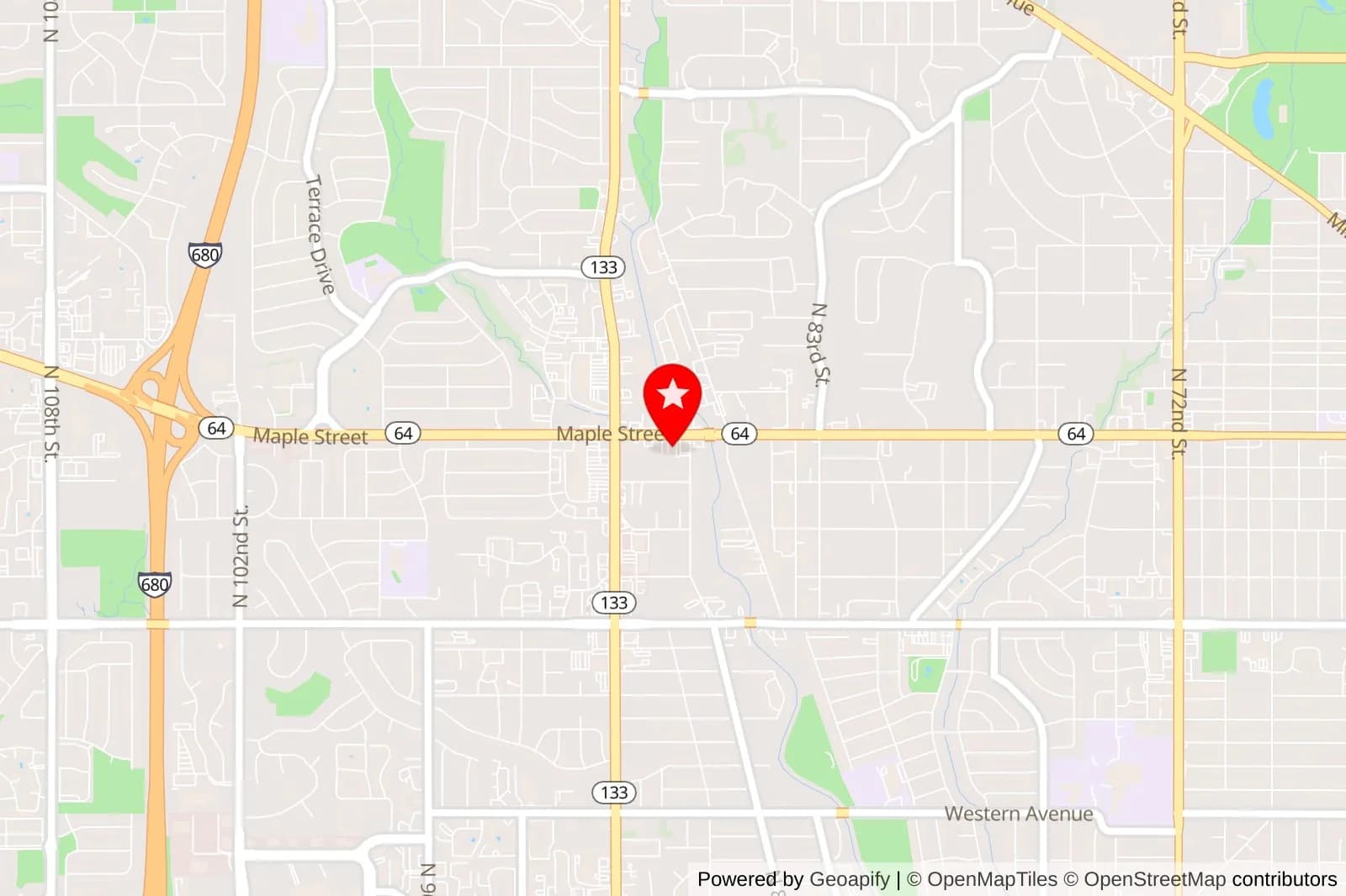 Map showing a red location pin on Maple Street near North 90th Street in Omaha