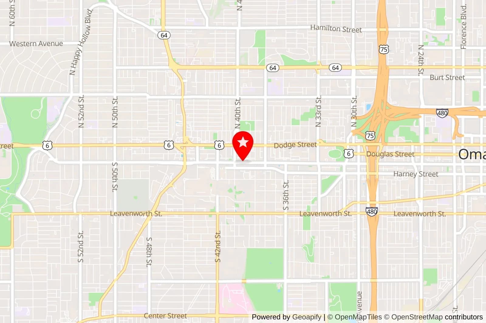 Map of central Omaha with a red location pin near Dodge Street and surrounding streets