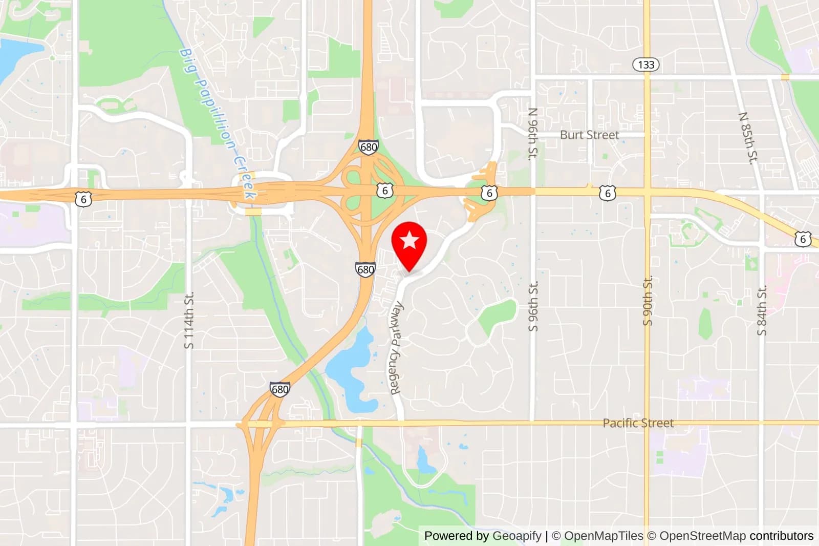 Map of central Omaha with a red location pin near Regency Parkway and West Dodge Road
