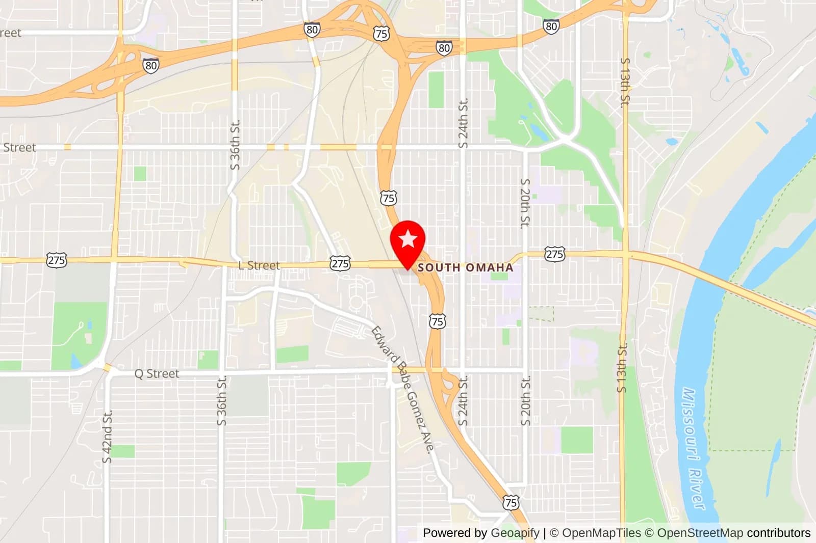 Map of South Omaha with a red star marker near L Street and Highway 75