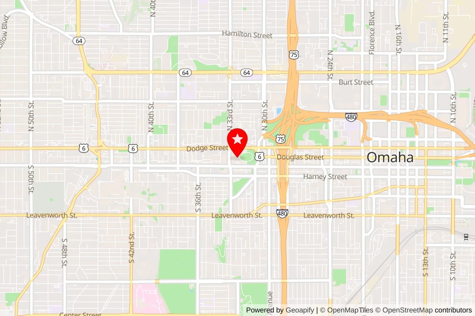 Map of Omaha with a red pin near Dodge Street and Saddle Creek Road