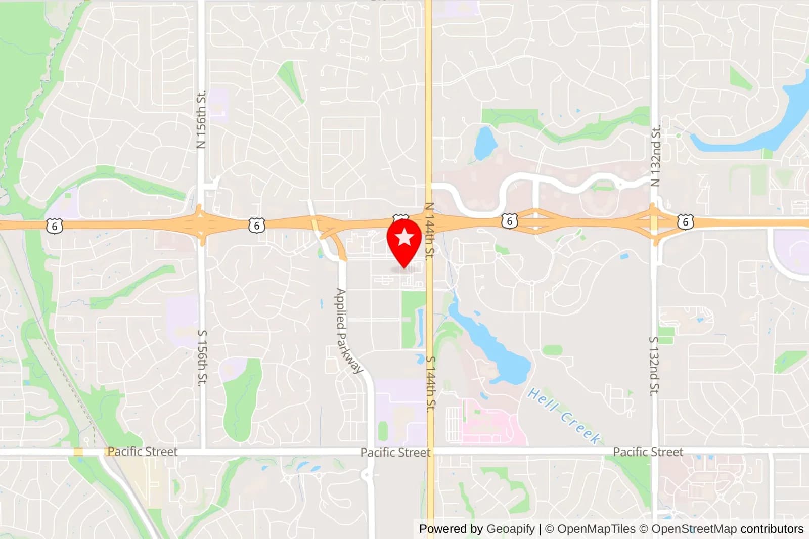 Map of West Omaha near Dodge Street and 144th Street with a red location pin