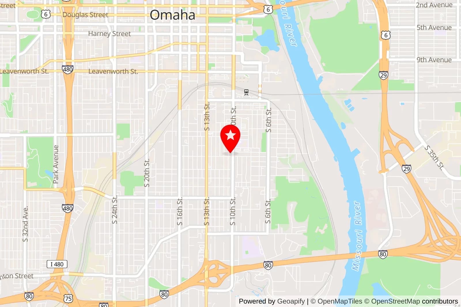 Map of Omaha with a red location pin near South 10th Street and the Missouri River