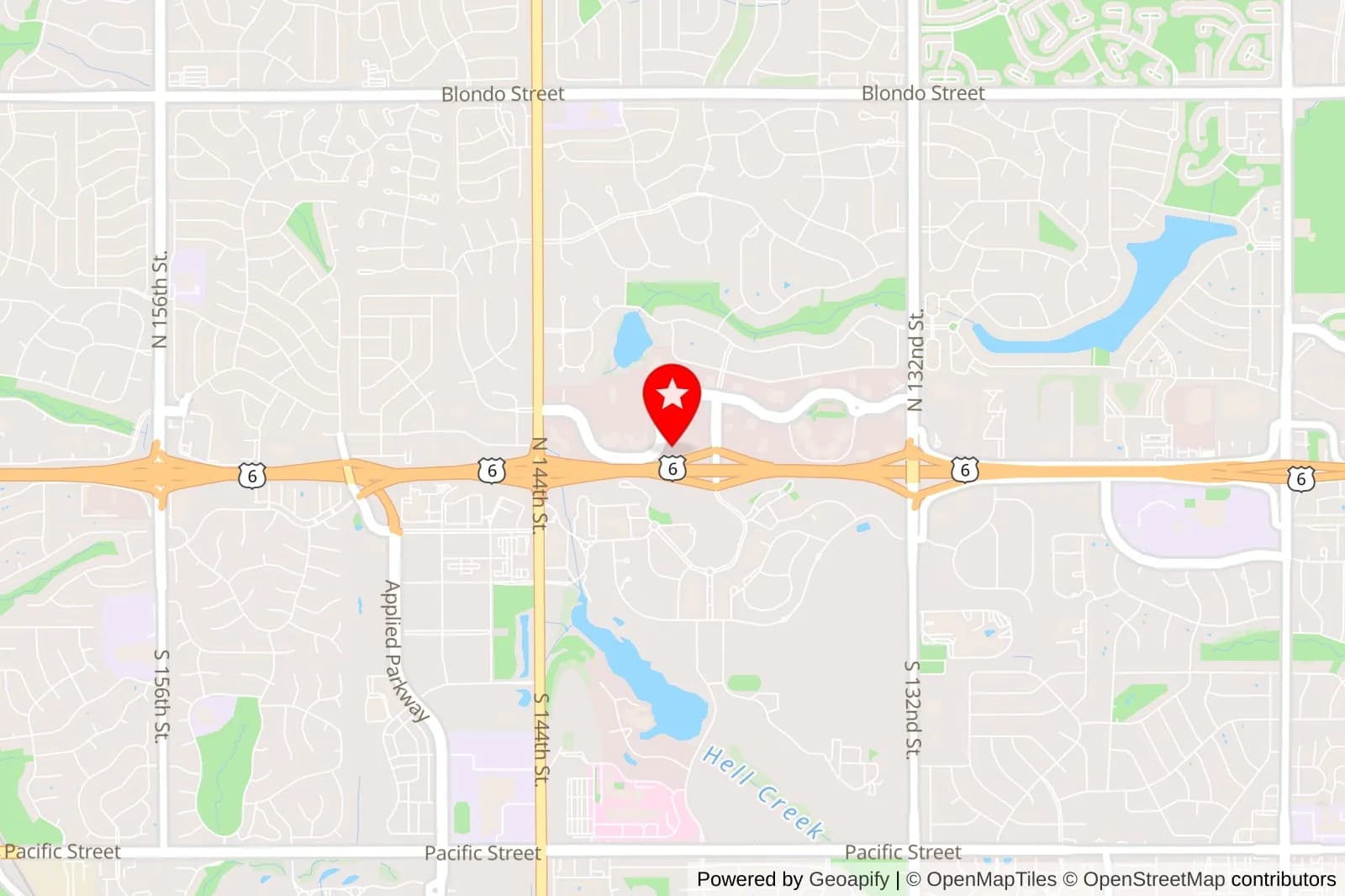Map of west Omaha with a red star marker near Highway 6 and North 114th Street