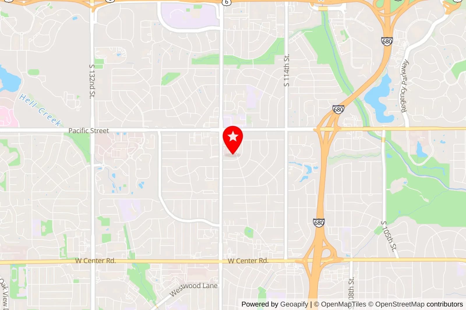 Map of Omaha streets with a red location pin near Pacific Street and South 119th Street