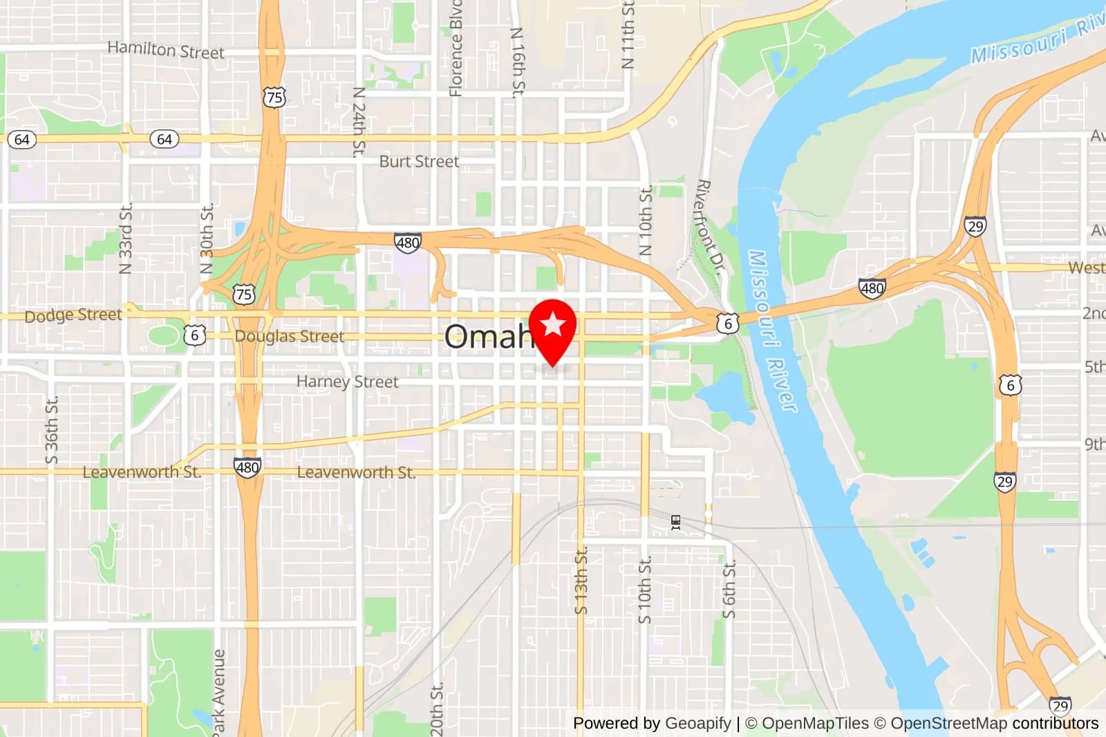 Map of downtown Omaha with a red location pin near Farnam Street and the Missouri River